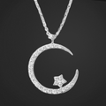Silver moon and star pendant necklace on a black background