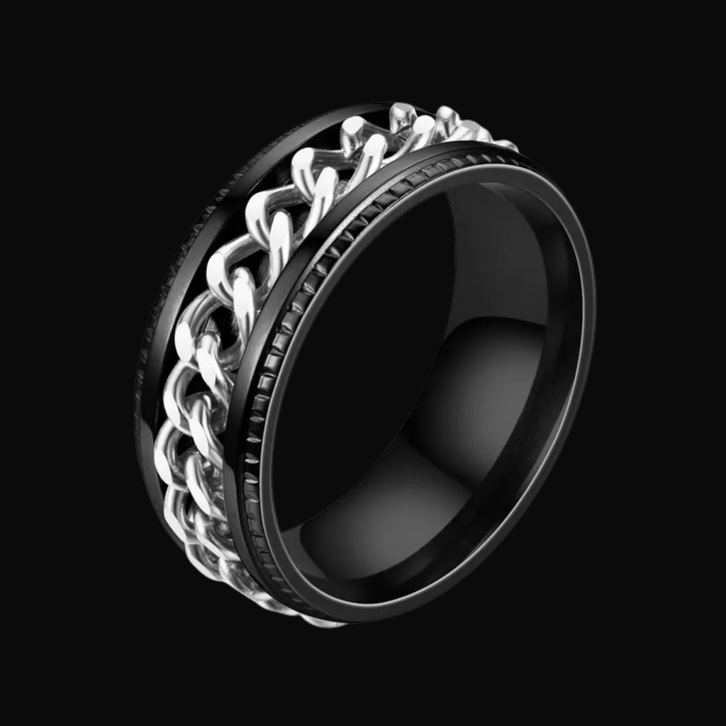 Black ring with silver chain design on a black background