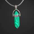 Green stone pendant on a silver chain against a black background
