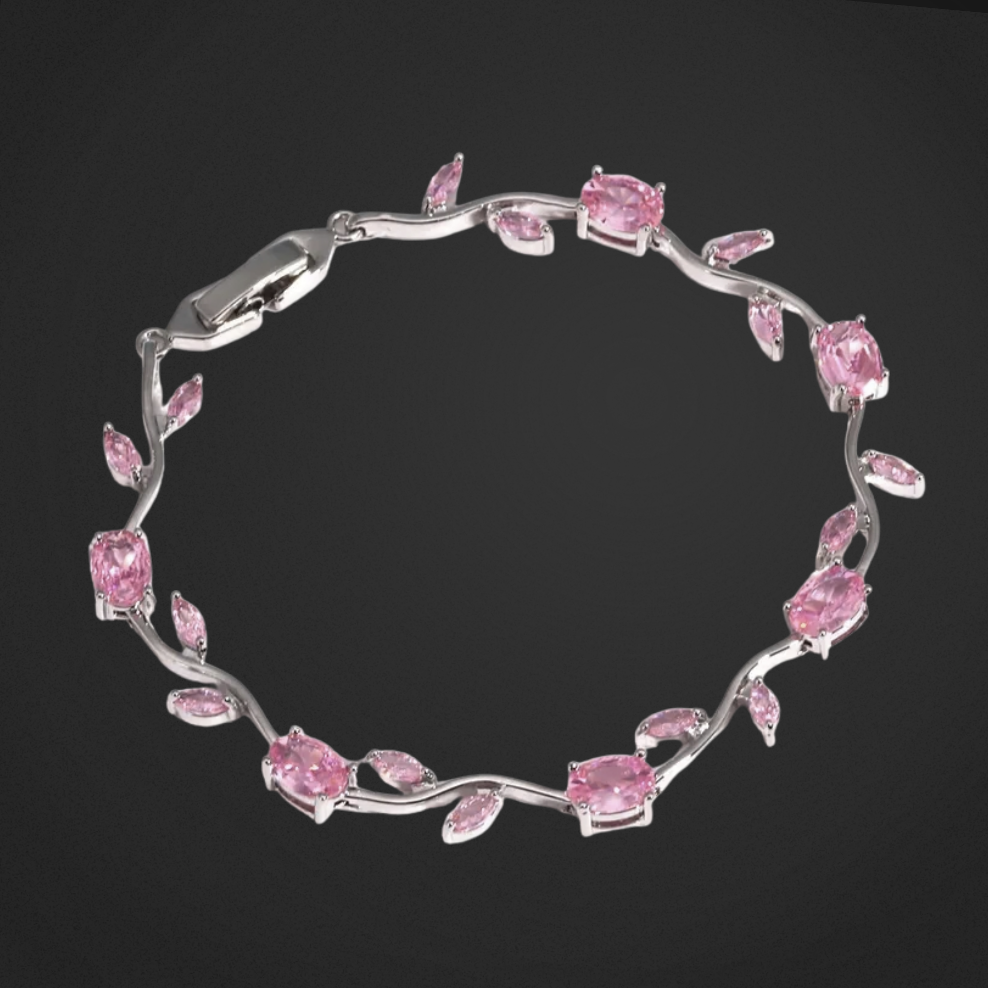 Silver bracelet with pink gemstones on a black background