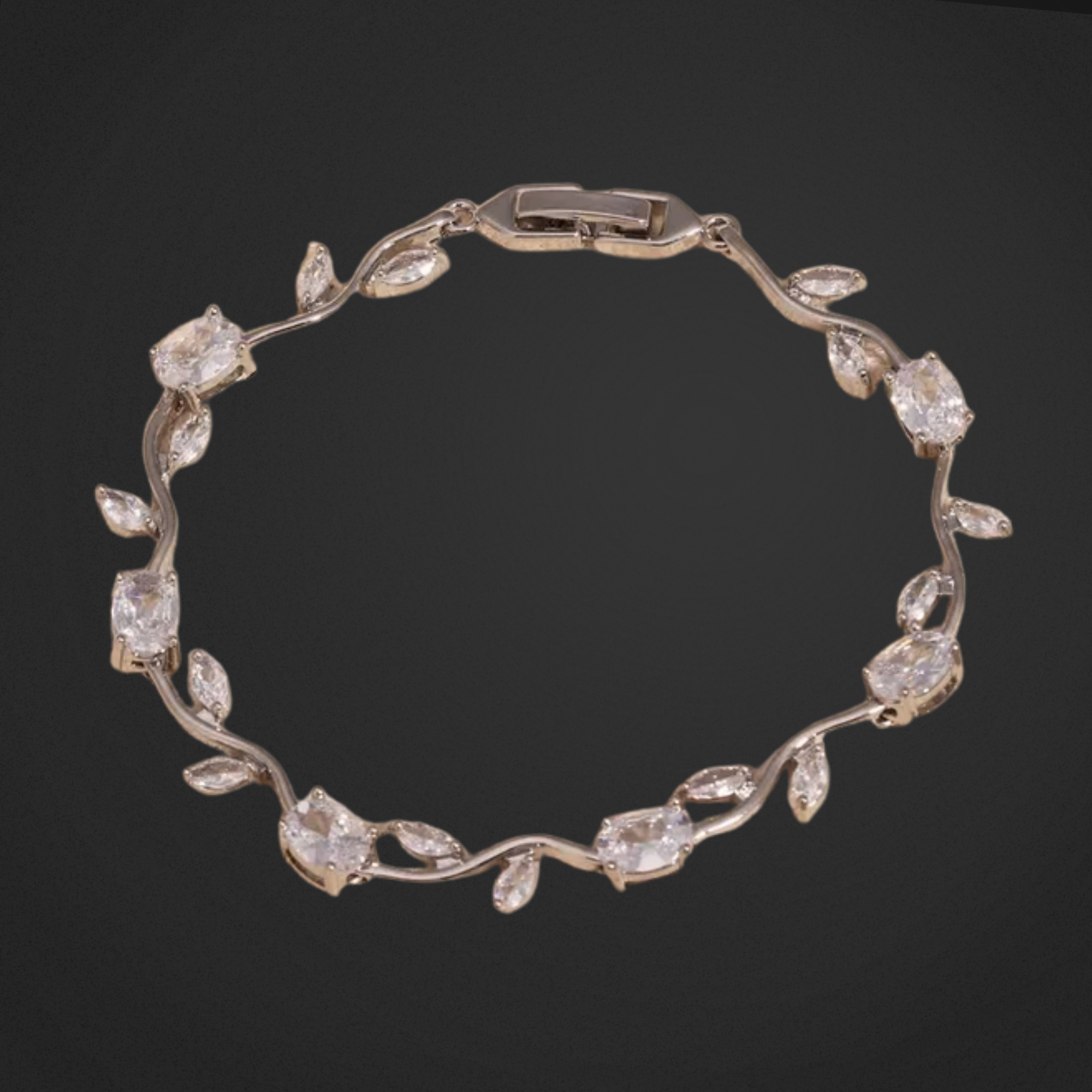 Silver bracelet with diamond-like stones on a black background