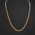 Gold chain necklace on a black background