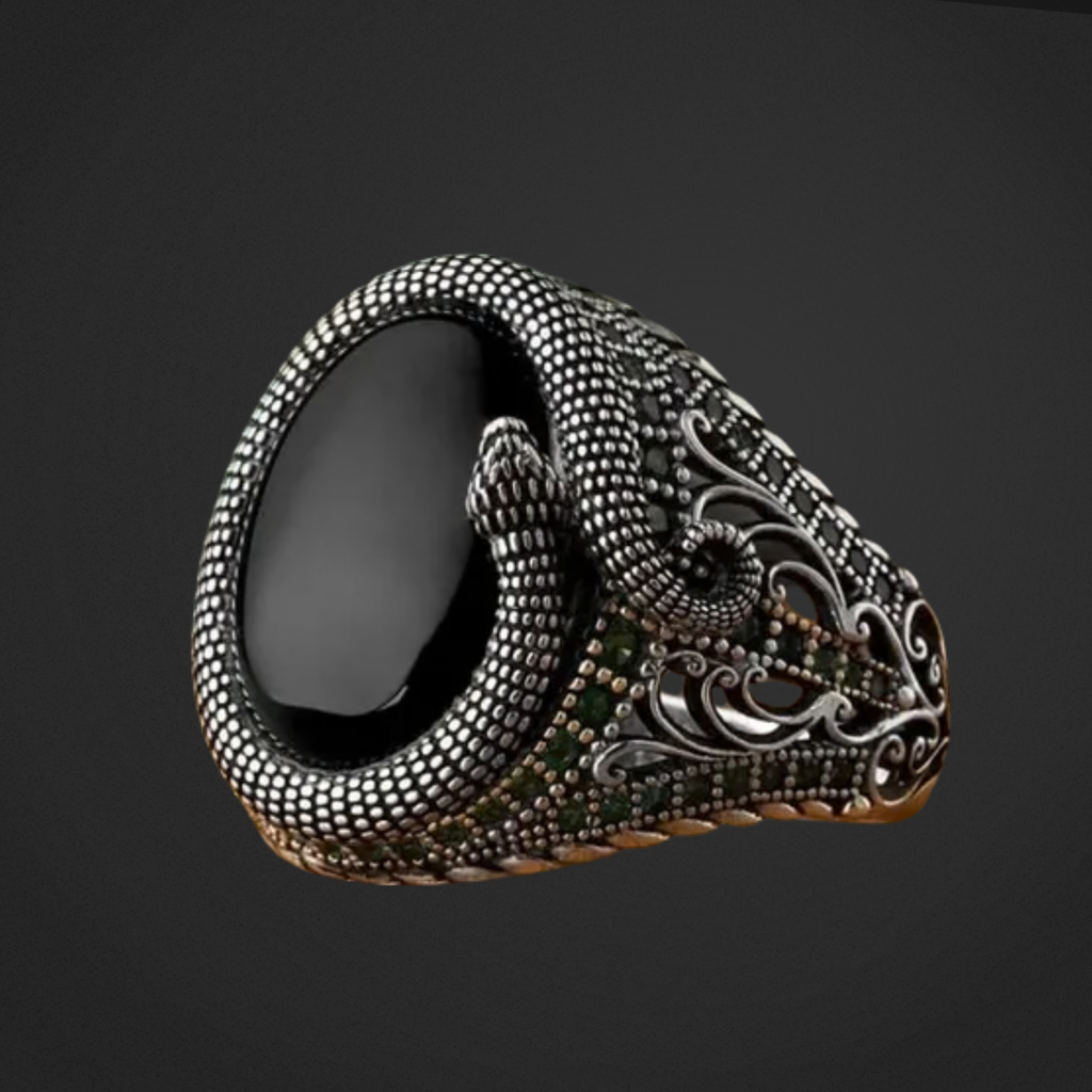 Decorative ring with intricate design on a black background