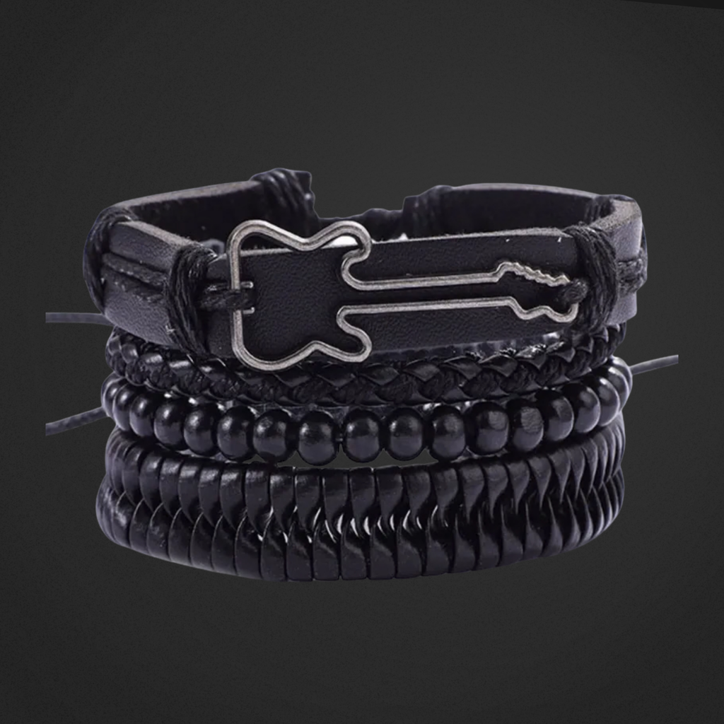 Stack of black leather bracelets with buckles on a dark background