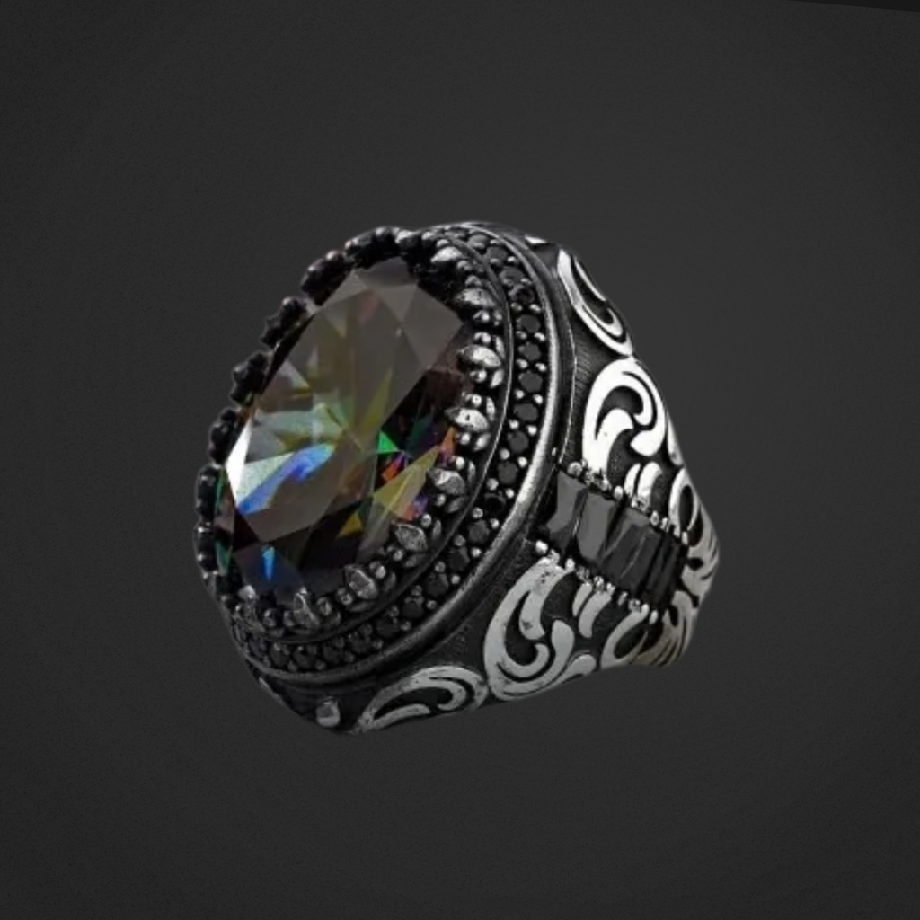 Decorative ring with a large gemstone on a black background