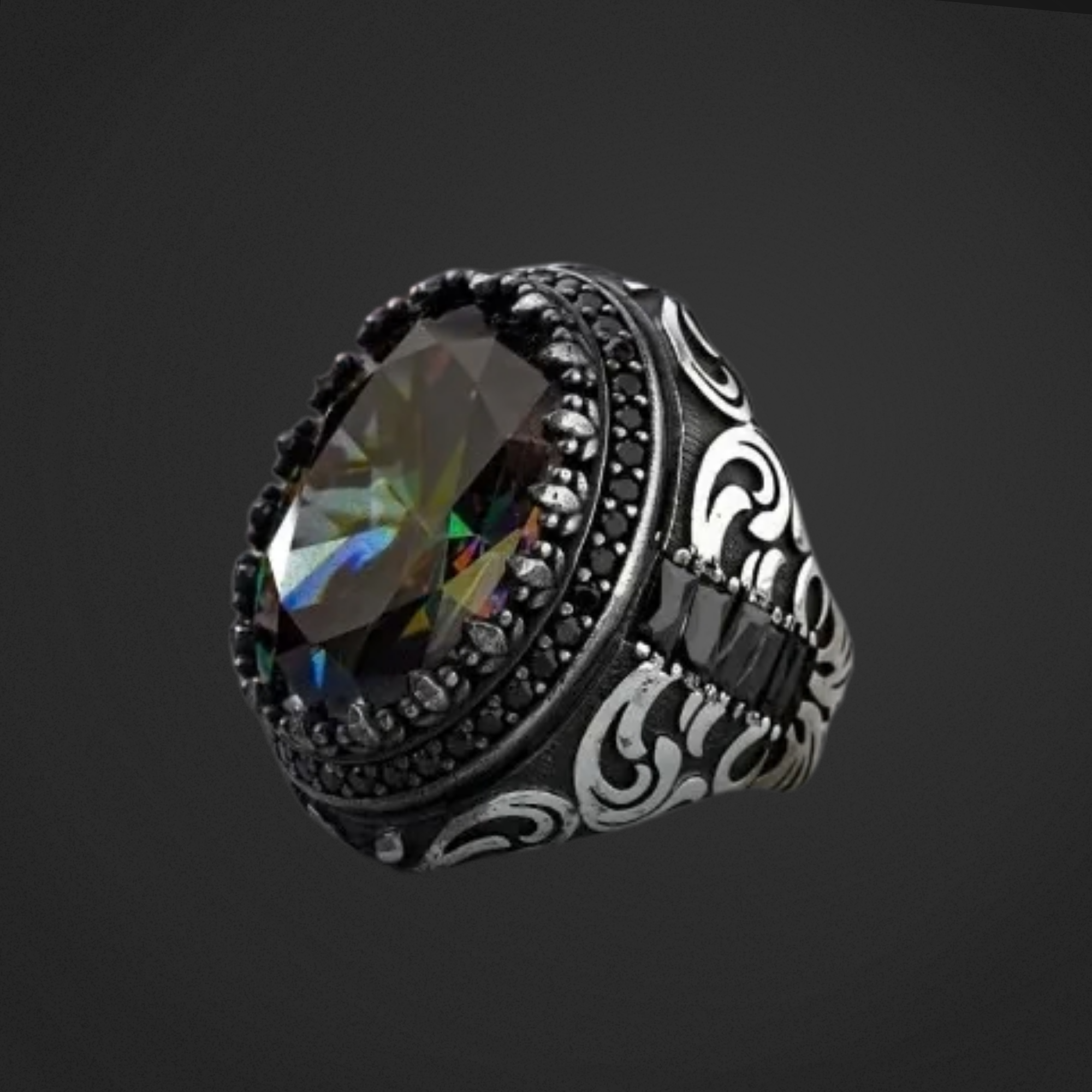 Decorative ring with a large gemstone on a black background